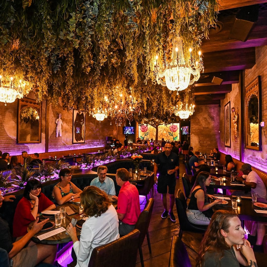 Vibrant interior of La Neta in Las Vegas, where guests enjoying the lively dining atmosphere often come searching for the best grilled chicken taco nearby